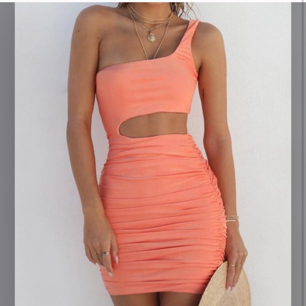Orange one shoulder cut out dress